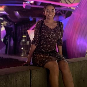 Ashy brown flower print dress, with cuffed sleeves.